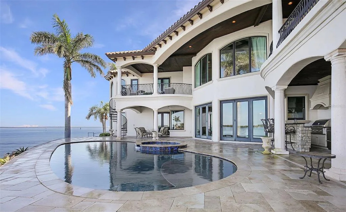 Well-maintained natural stone pool deck